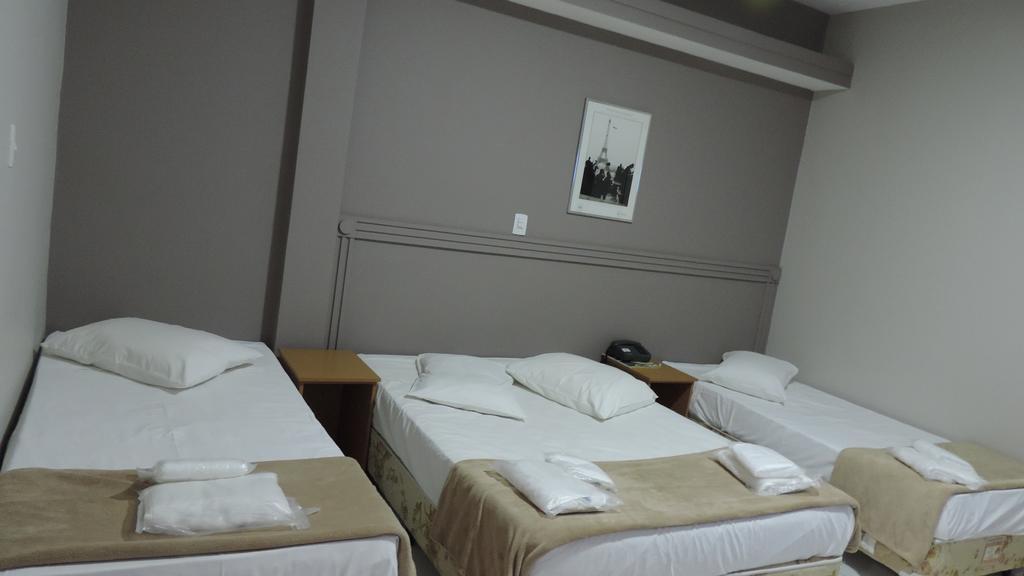 Presidente Hotel Passos Bagian luar foto